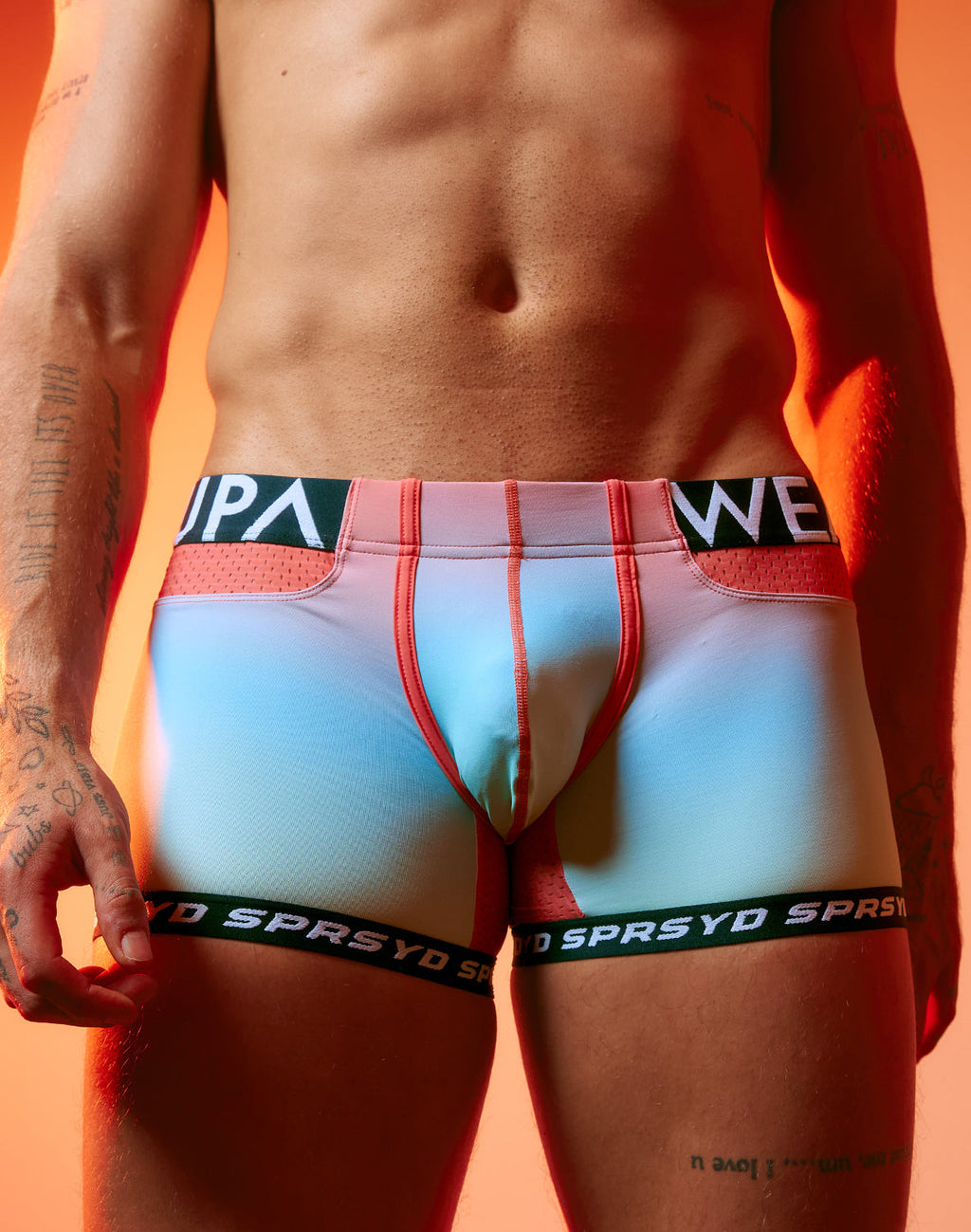 Rainbow gradient Supawear SPR Max trunks by CITYBOYZ★USA, showcasing vibrant, snug-fitting men's underwear with bold color design.