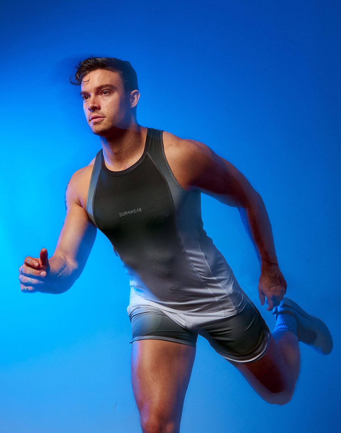 Supawear SPR Performance Gradient Tank Top in black and white, featuring a sleeveless athletic design by CITYBOYZ★USA.