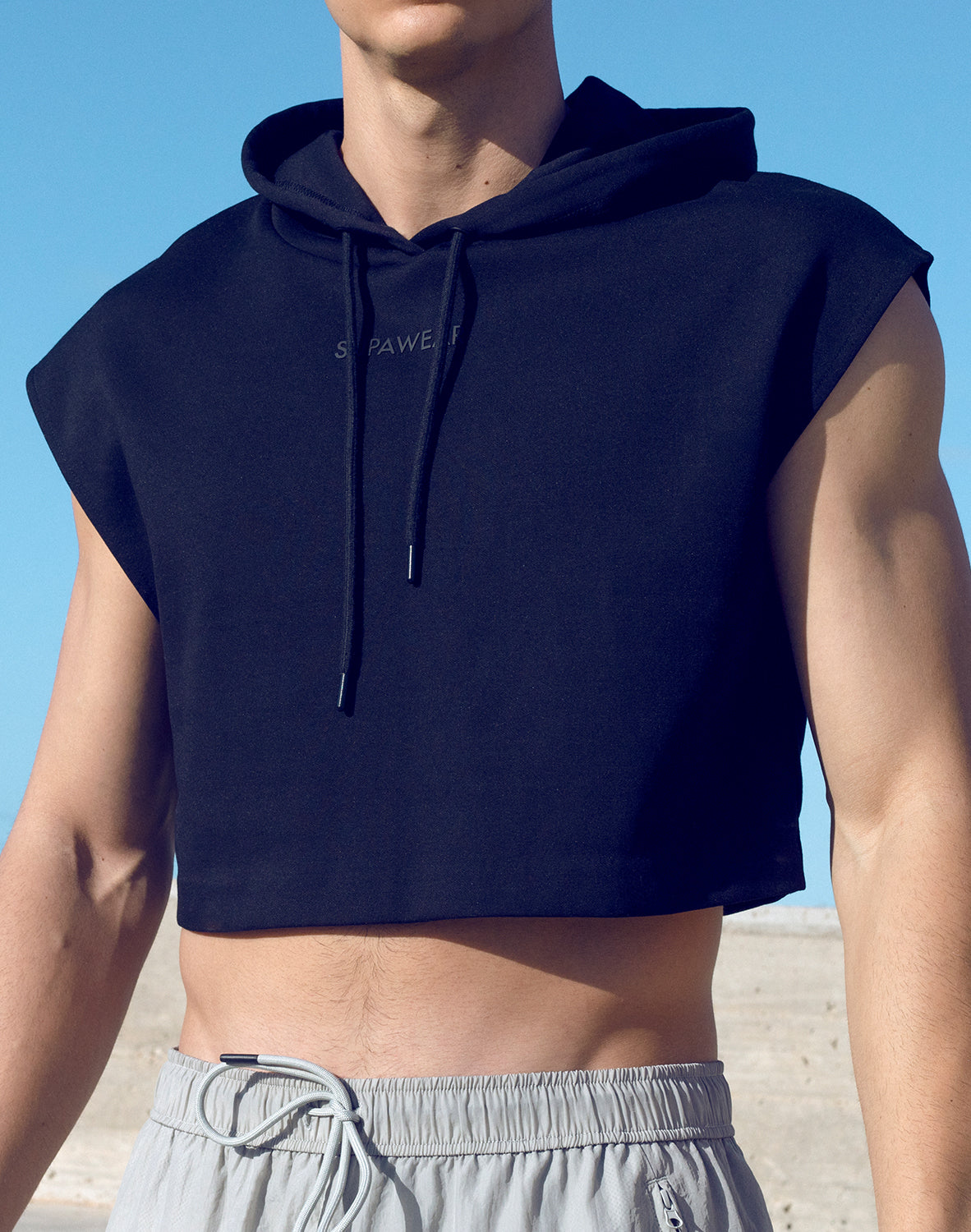 Black Supawear cropped hoodie from CITYBOYZ★USA, activewear with a relaxed fit and ribbed cuffs, displayed on a plain background.