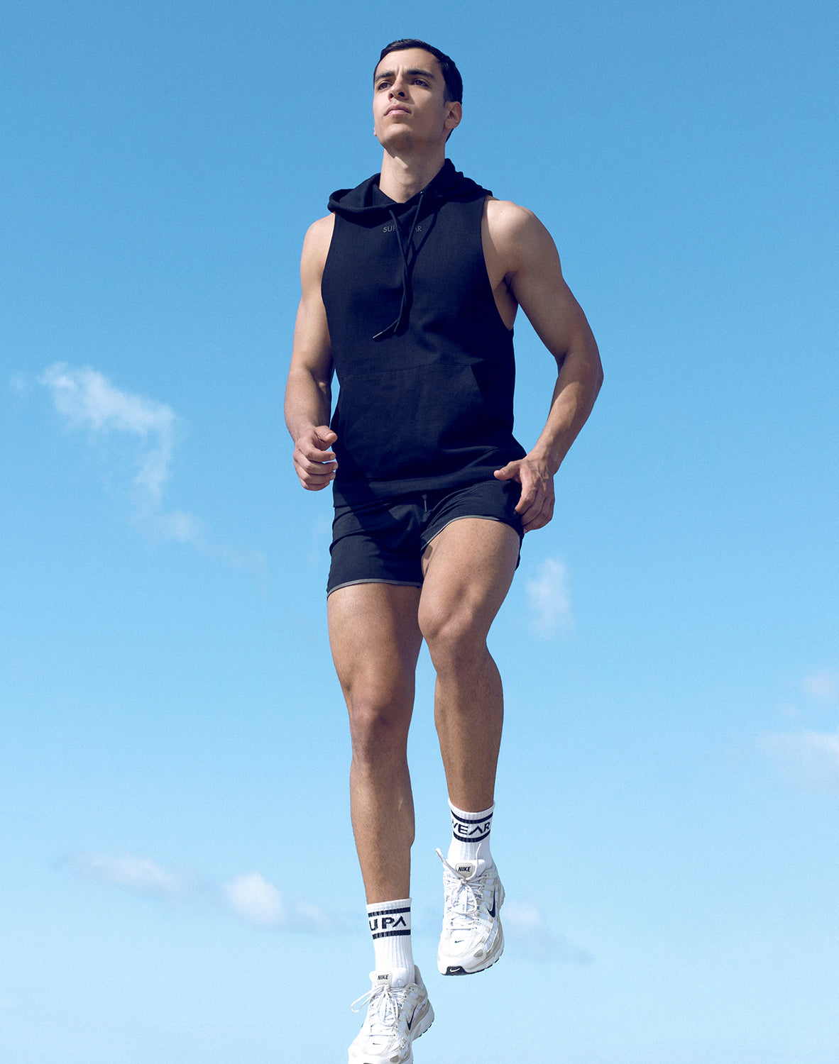 Black Supawear sleeveless hoodie from CITYBOYZ★USA activewear collection, shown on a model with a casual fit and sleeveless design.