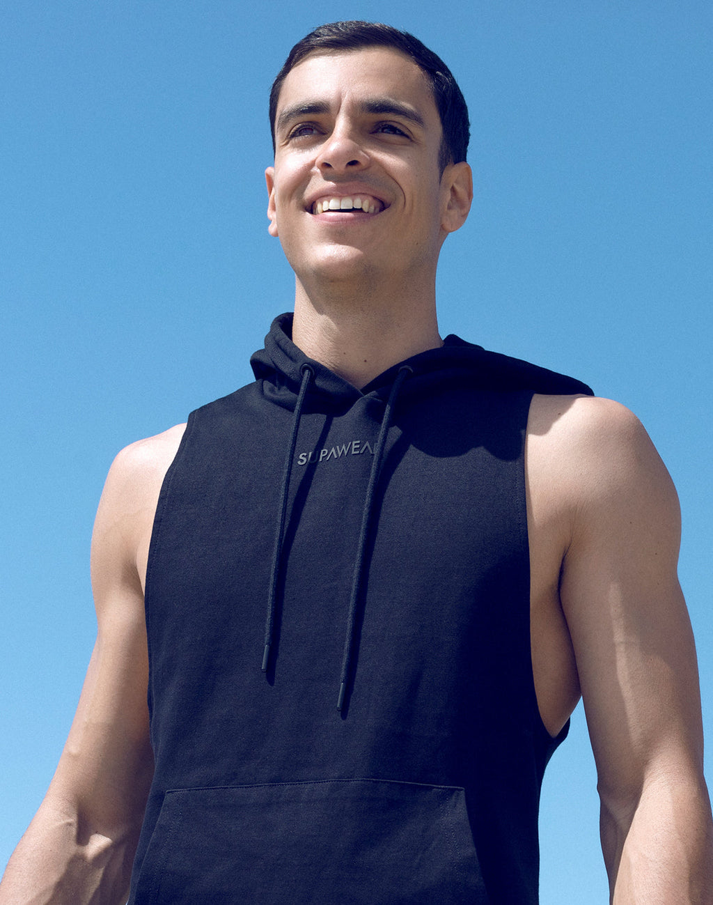 Black Supawear sleeveless hoodie from CITYBOYZ★USA activewear collection, shown on a model front view with hood up and sleeveless design.