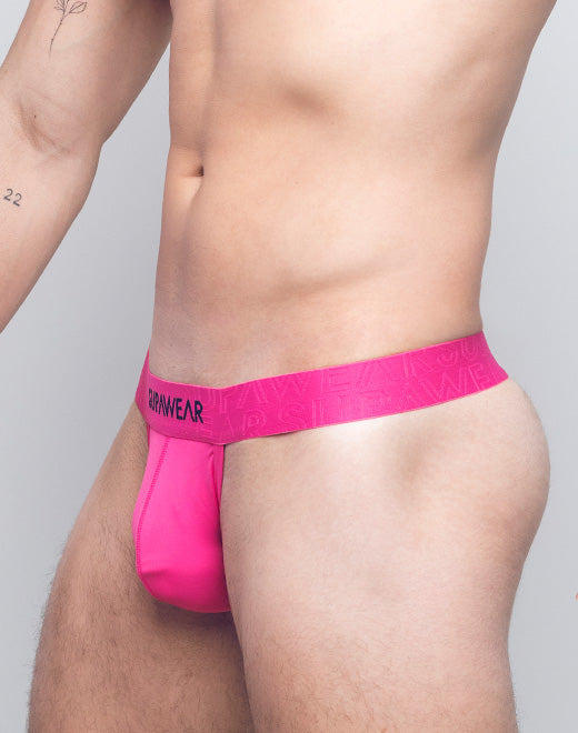 Supawear Neon Thong underwear from CITYBOYZ★USA, featuring bright neon fabric and slim straps on a white background.