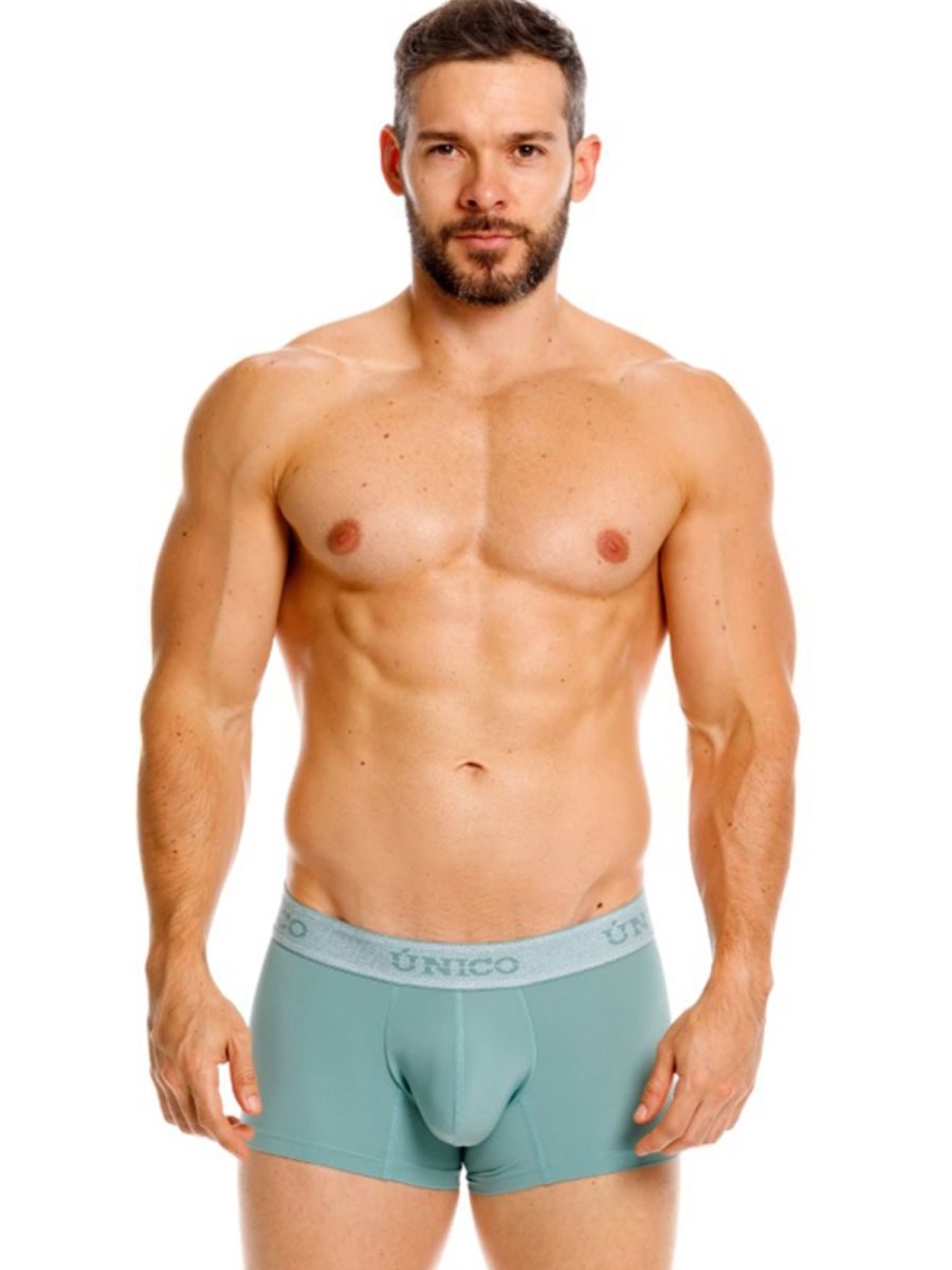 Green Unico ceramic trunk by CITYBOYZ★USA with a smooth ceramic finish and decorative design, used for storage or display.