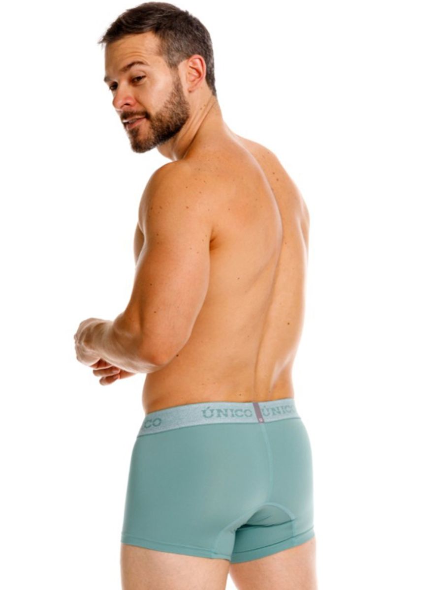 Green Unico ceramic trunk by CITYBOYZ★USA with intricate design and sturdy handles, showcasing a stylish storage solution.