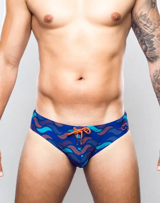 CityBOYZ USA 2Eros Ocean Print Swim Brief V10 featuring vibrant blue ocean wave design, snug fit, and lightweight swimwear fabric.
