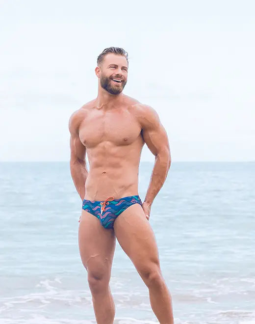 CityBoyz USA 2Eros Ocean Print Swim Brief V10 featuring vibrant blue ocean wave design and comfortable swimwear fit.
