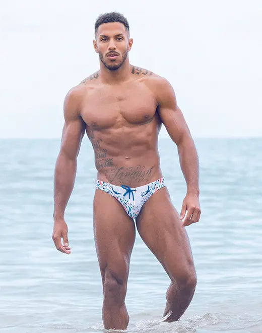 CityBOYZ USA 2Eros Seascape swim brief in navy with ocean wave pattern, designed for comfort and style in the water.