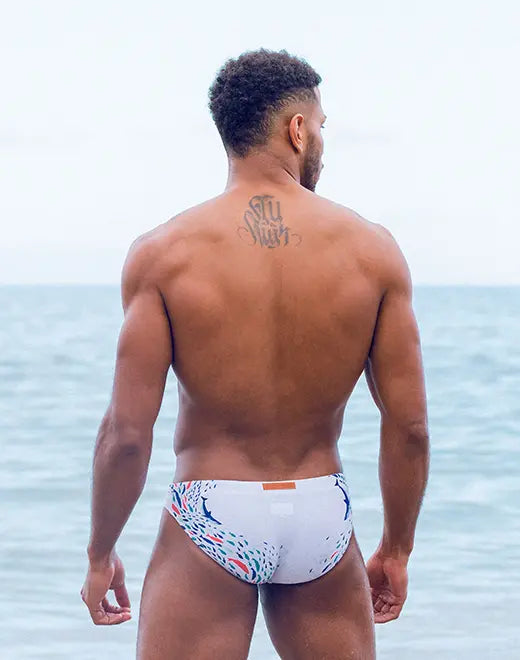 Bright blue Eros Seascape swim brief by CITYBOYZ★USA featuring a vibrant ocean-inspired seascape design.