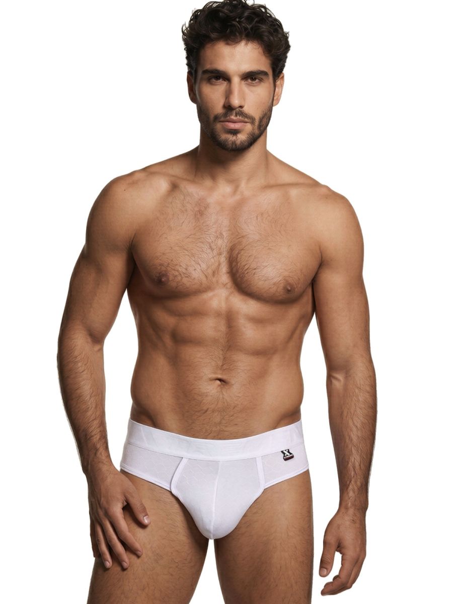 White Xtremen microfiber thong from CITYBOYZ USA with sleek design and comfortable fit, shown on a model or flat lay.