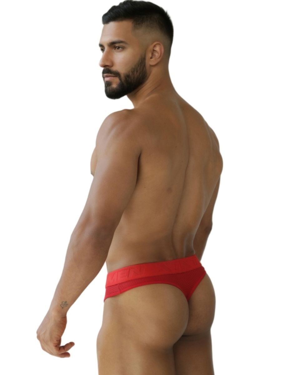 Red Xtremen microfiber mesh thong by CITYBOYZ★USA, featuring a sleek design and comfortable fit, shown on a model.