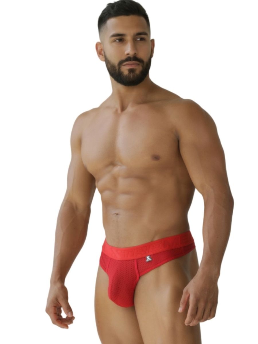 Red Xtremen microfiber mesh thong by CITYBOYZ★USA, featuring sleek design and breathable fabric, shown on a model.