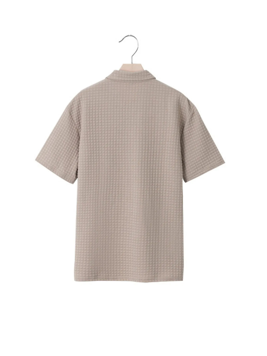 Men's waffle short sleeve polo shirt with zipper detail by Trendsi, featuring a stylish and comfortable design.