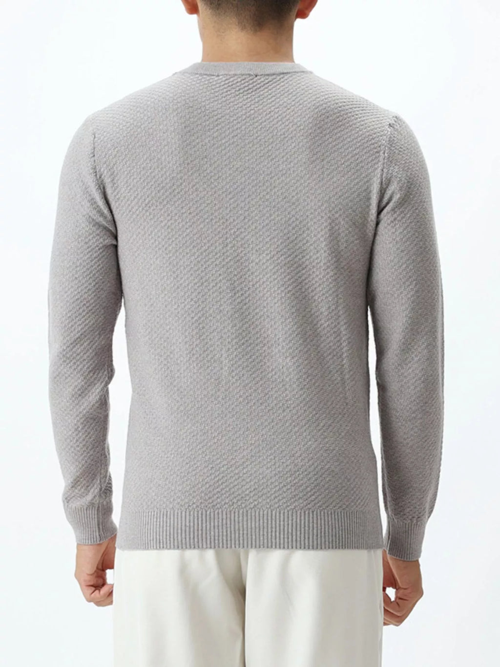 Plus size textured crew neck sweater for men by Trendsi, featuring a cozy knit design and comfortable fit.