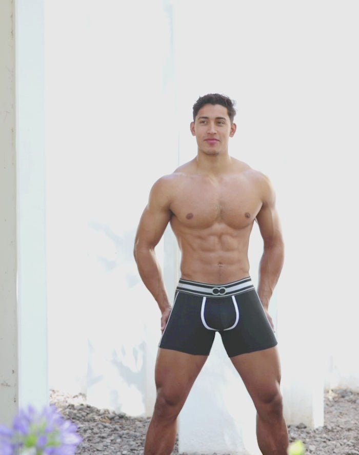 CityBOYZ★USA 2Eros Heracles brief trunk underwear, white fabric with black waistband, close-up of front view.