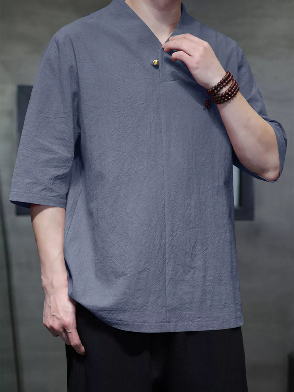 Nobilityze men's plus size solid color 3/4 sleeve shirt from Trendsi, featuring a relaxed fit and comfortable fabric.