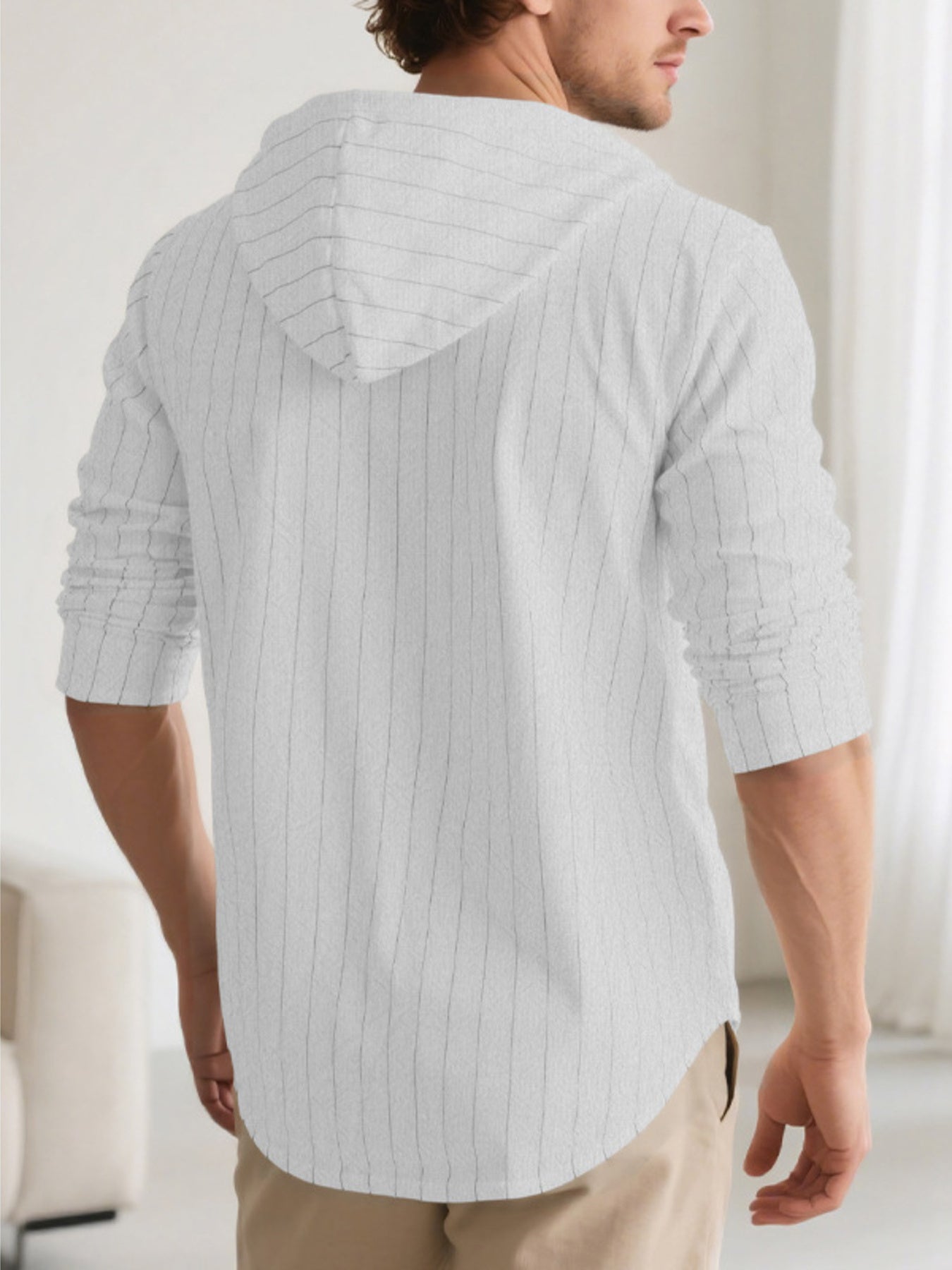 Plus size men's hooded button-up shirt by Trendsi featuring a drawstring hood and casual shirt style.