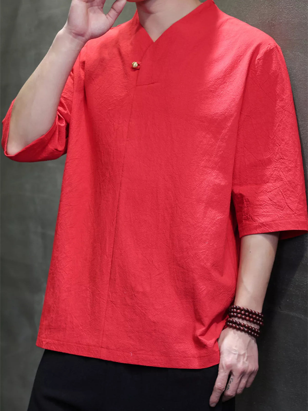 Men's plus size solid color 3/4 sleeve shirt by Trendsi, featuring a comfortable fit and casual style, shown in the product image.