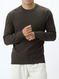 Plus size men's ValiantMan textured crew neck sweater by Trendsi, featuring a cozy knit pattern and comfortable fit.