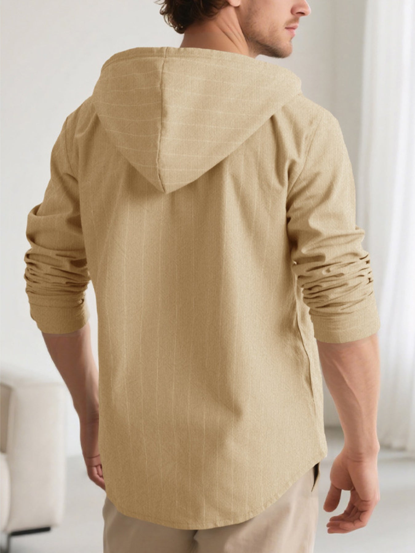 Plus size men's hooded button-up shirt by Trendsi featuring a drawstring hood and casual style.