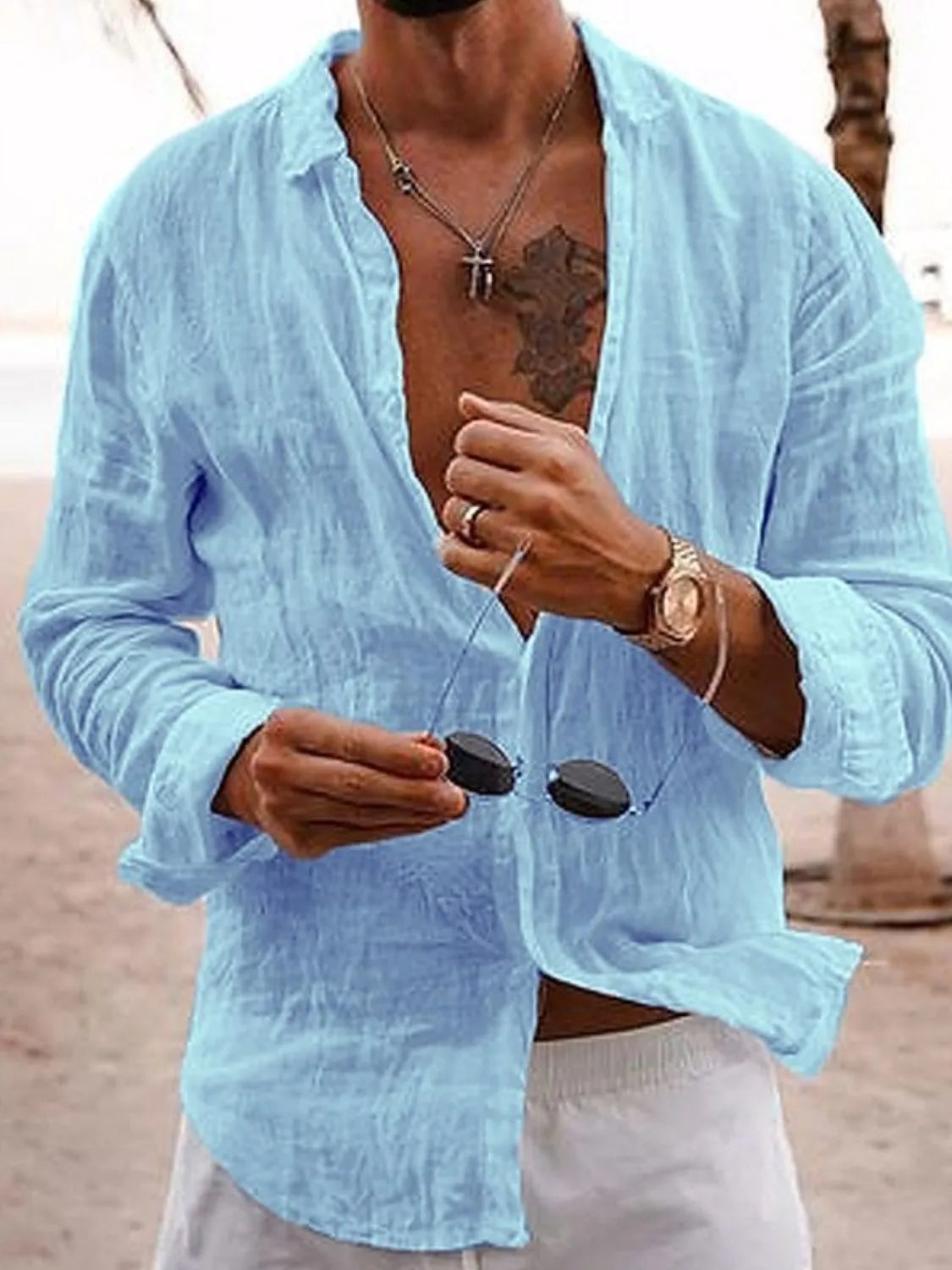 Men's full size button-up long sleeve shirt by Trendsi, featuring a classic design and fit.