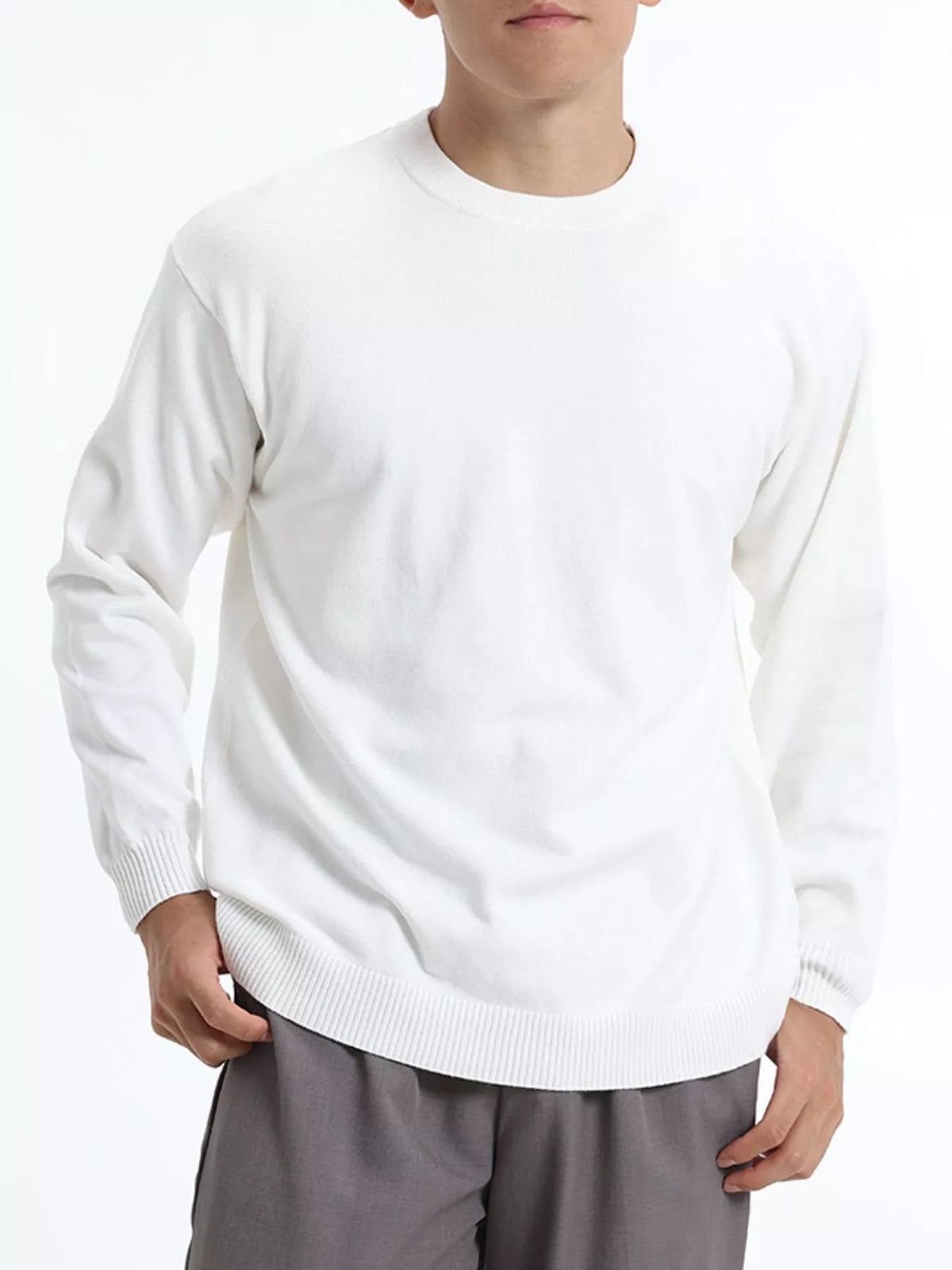ValiantMan men's minimalist crew neck sweater with ribbed cuffs, in a neutral color, designed for a sleek, modern look.