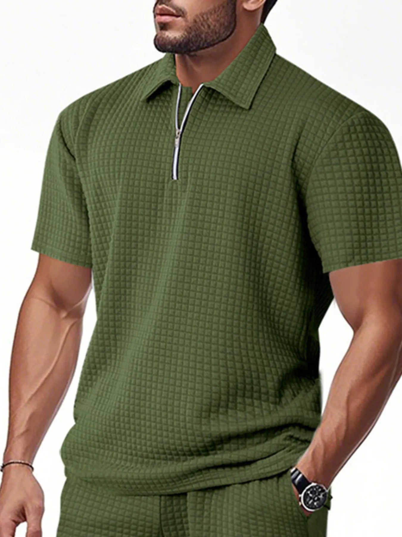 Men's waffle short sleeve polo shirt with zipper detail from DapperMate by Trendsi, featuring a casual, textured fabric design.