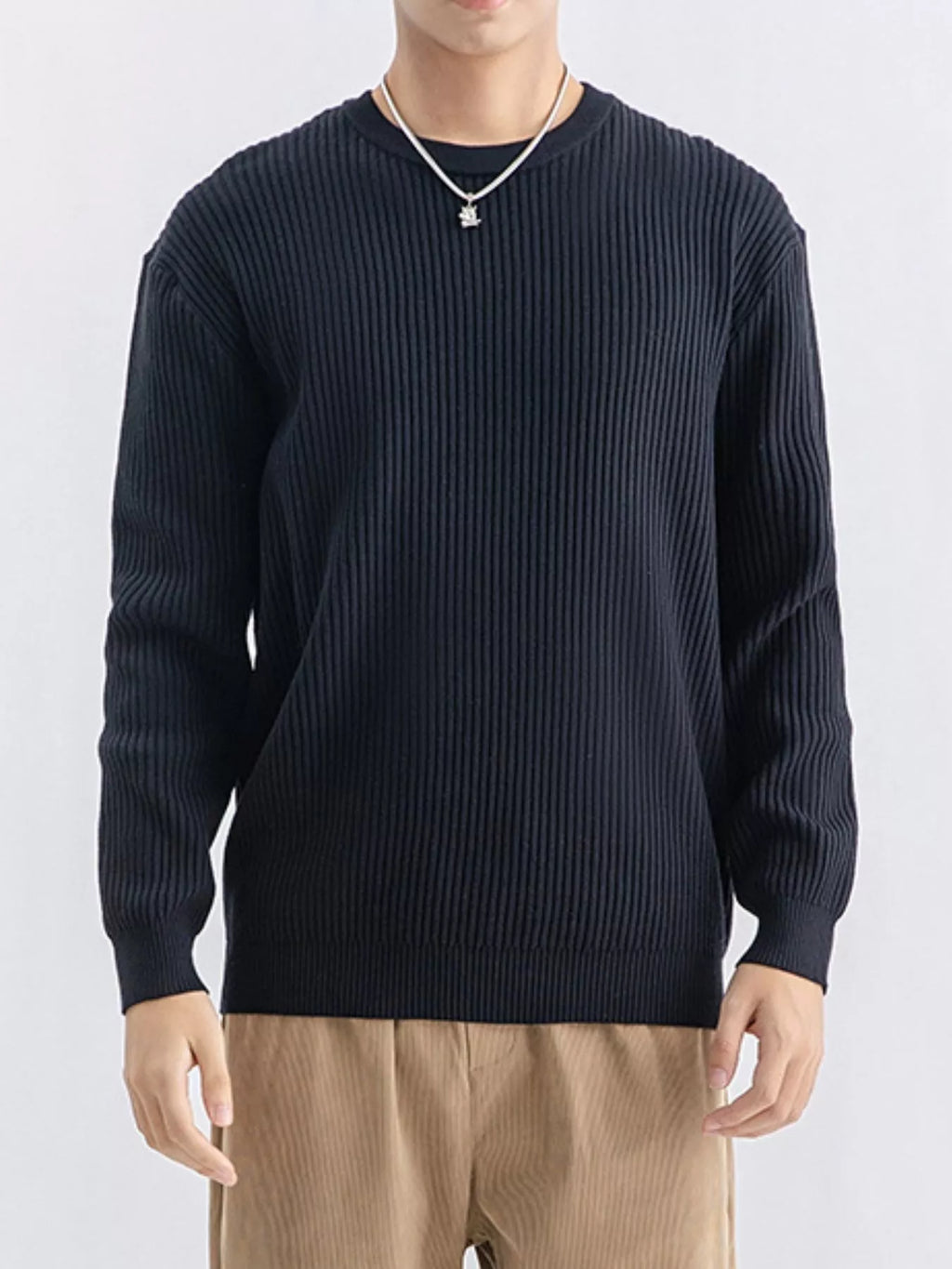 Plus size men's ribbed knit crew neck sweater by Trendsi, showcasing the soft, textured fabric and classic fit.