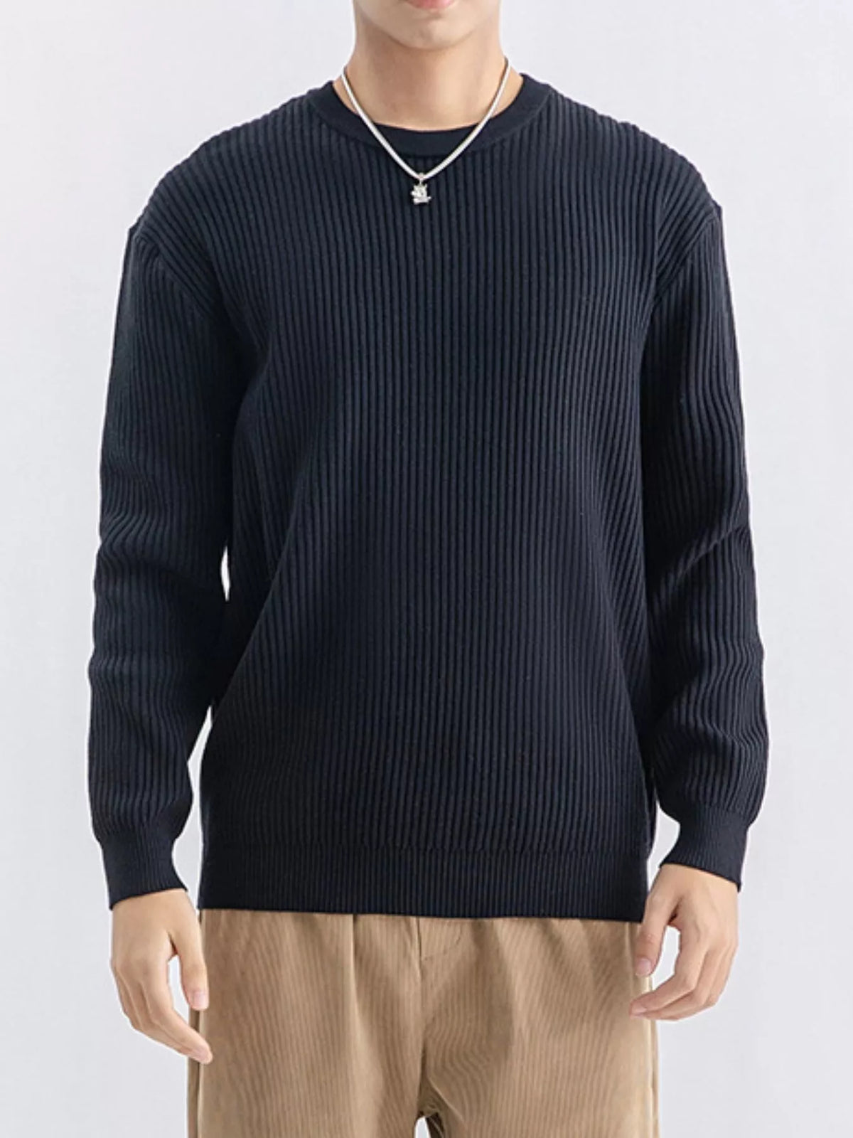 Plus size men's ribbed knit crew neck sweater by Trendsi, showcasing the soft, textured fabric and classic fit.
