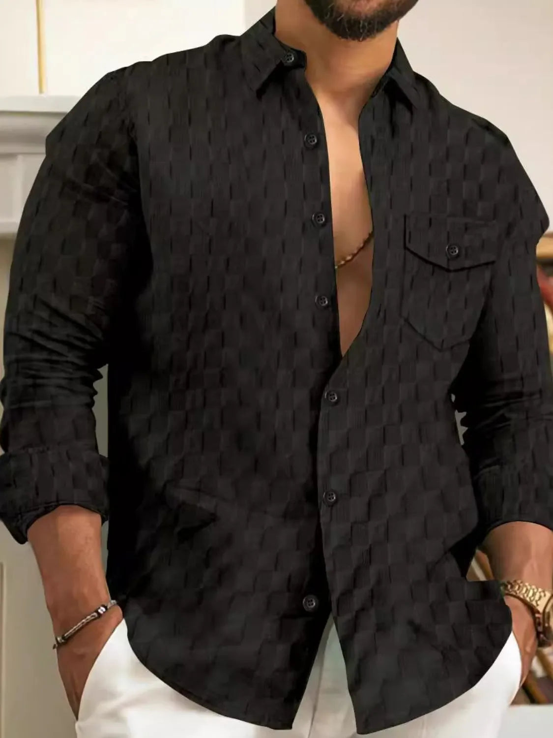 Men's full-size button-up long sleeve shirt by Trendsi, featuring a classic design and tailored fit, shown in a stylish color.