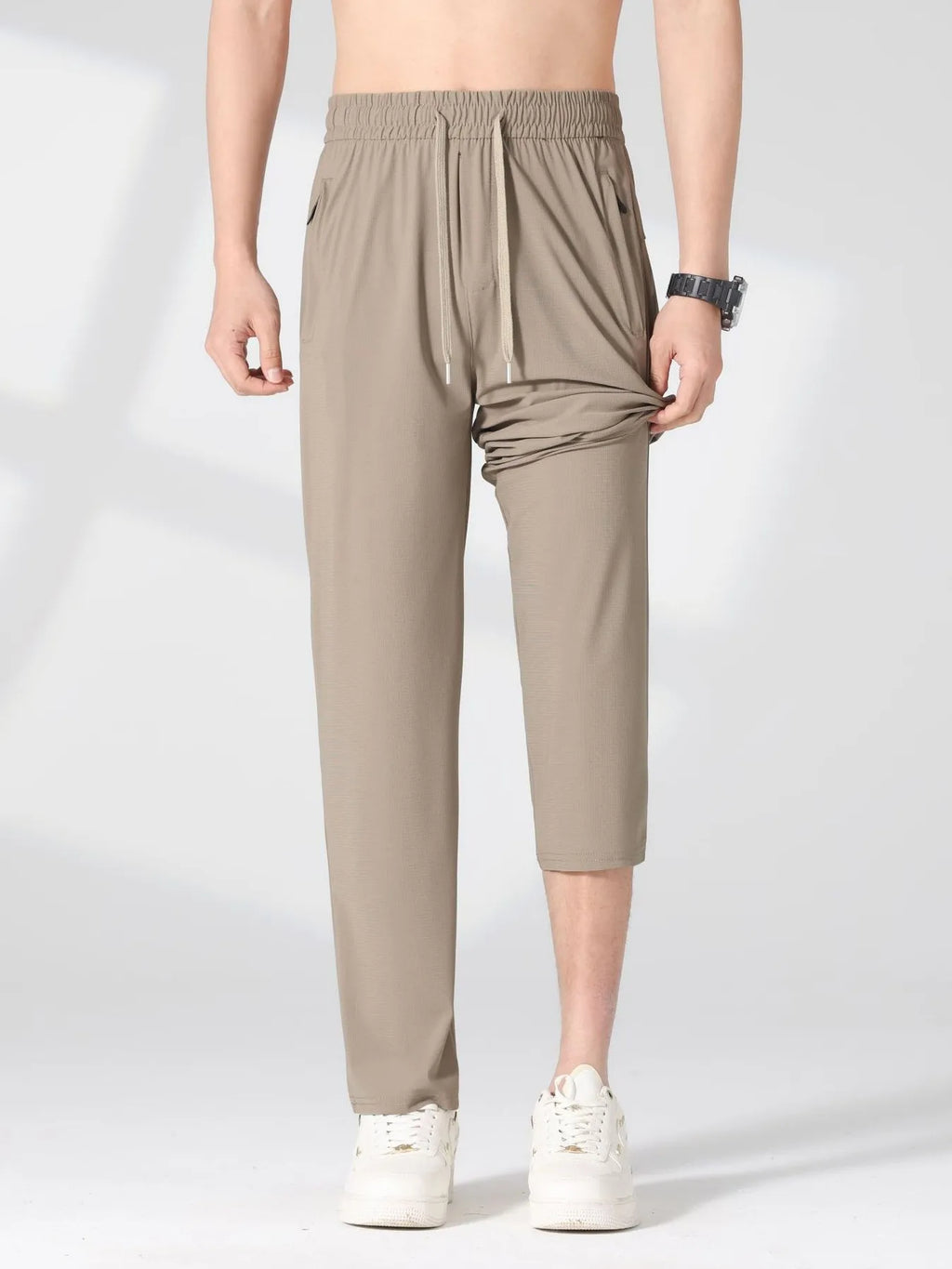 Plus size men's lightweight quick-dry casual pants by Trendsi, shown in a relaxed fit with breathable fabric and functional design.