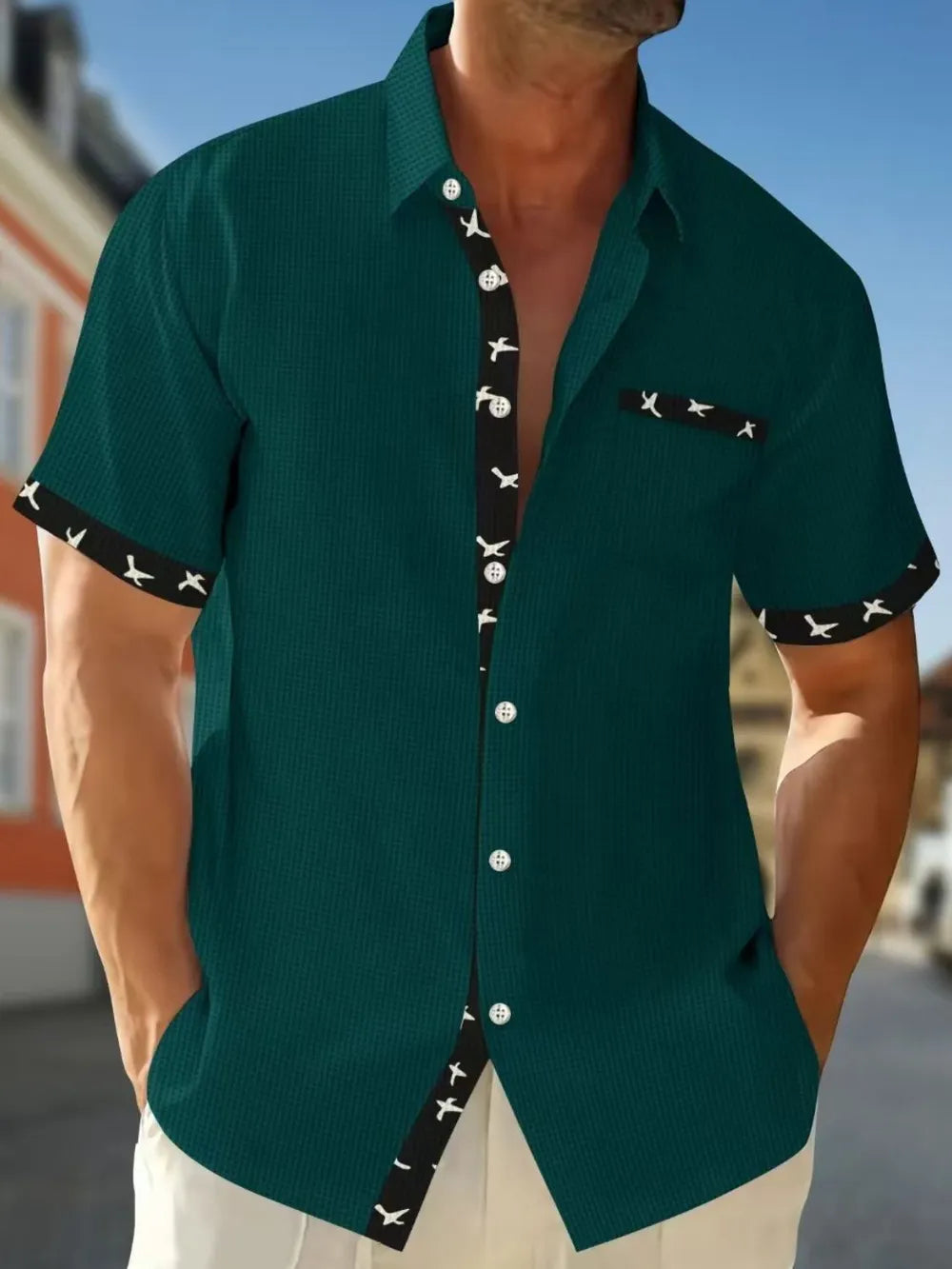 Men's full size waffle knit short sleeve shirt with contrast trim by Trendsi, featuring a textured fabric and casual style.