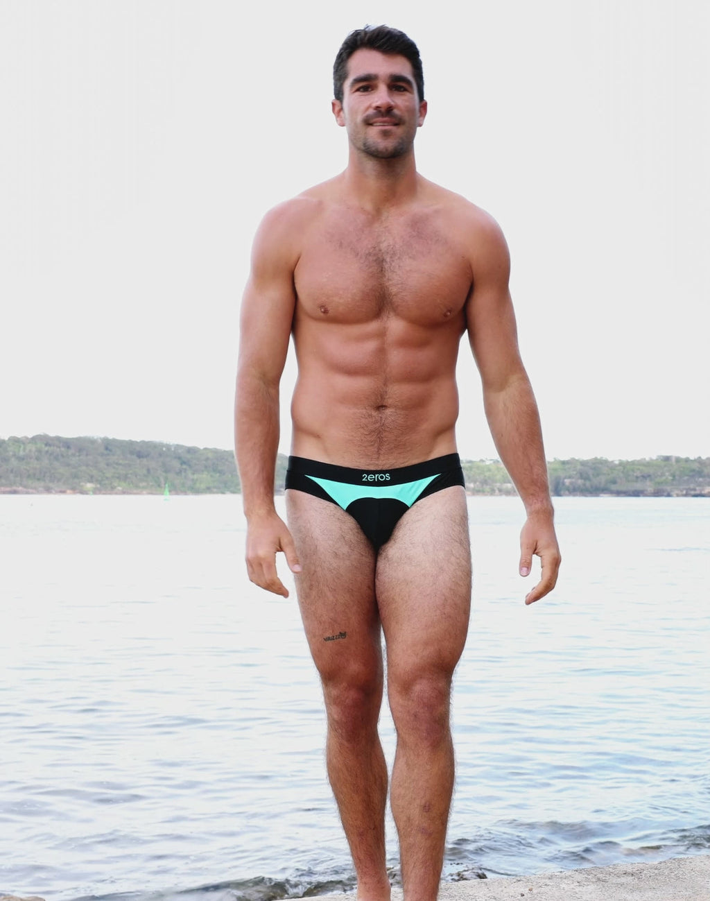 CITYBOYZ★USA 2Eros Aktiv Racer swim brief in vibrant colors, shown on a model, highlighting the sleek, form-fitting design.