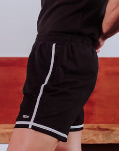CityBoyz USA Supawear Crux short athletic shorts in black with a comfortable fit and drawstring waistband, on a hanger.