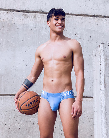 Blue Supawear SPR Max Brief underwear by CITYBOYZ★USA shown on a model, highlighting the snug fit and stylish design.