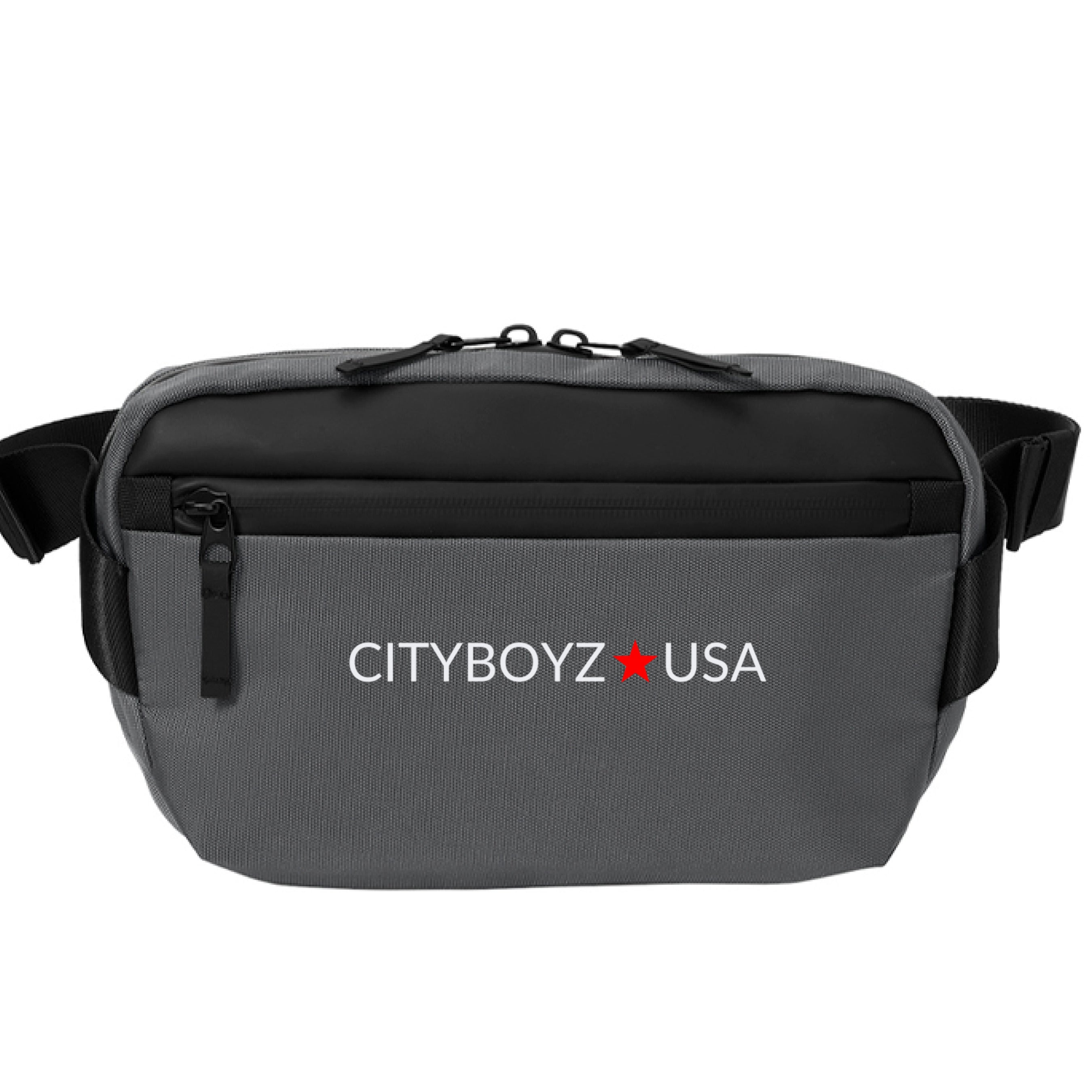 CITYBOYZ★USA Mercer Mettle Crossbody Pack with adjustable strap and multiple compartments, shown in black fabric.