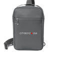 CityBOYZ USA Port Authority® matte sling backpack with adjustable straps, front zipper pocket, and stylish design.