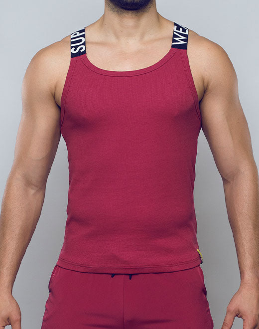 Red Supawear SPR Max Tank Top by CITYBOYZ★USA displayed on a hanger, showcasing its sleeveless design and comfortable fit.