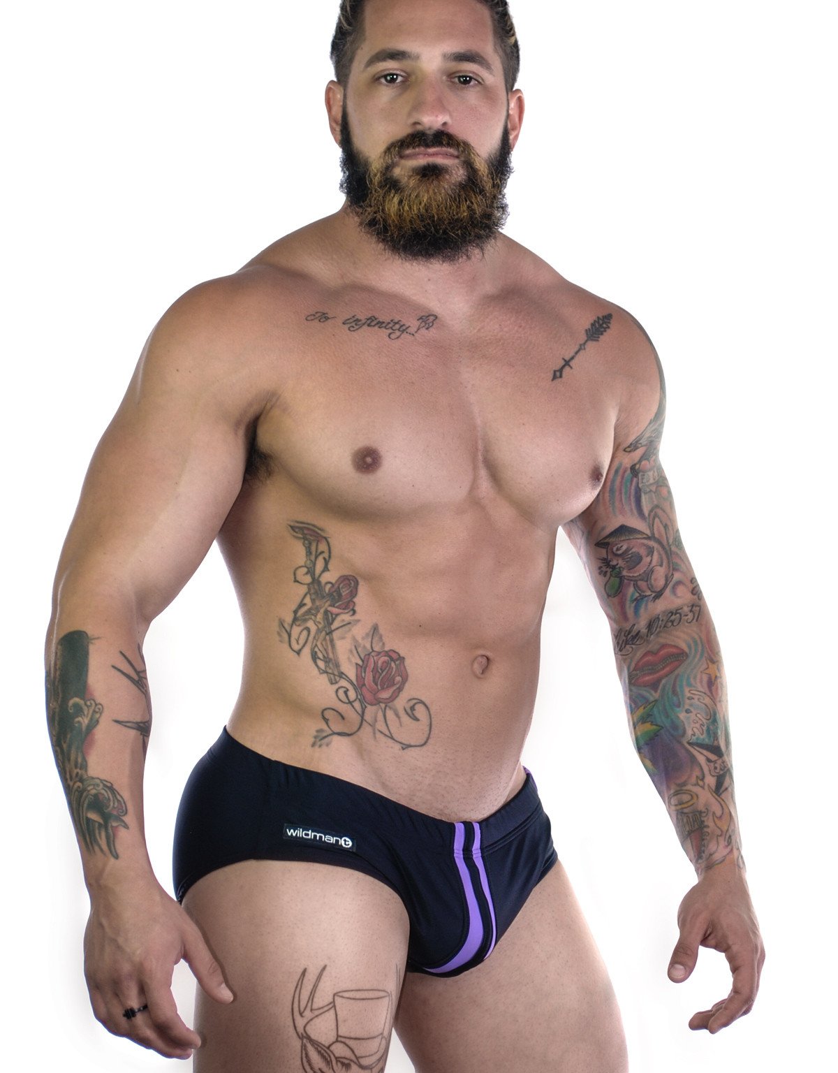 Wildmant Sportivo bikini in black and purple swimwear with side view, featuring a sleek design and sporty fit.