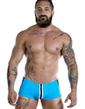 WildmanT Sportivo square cut teal swimwear front view, showcasing the vibrant teal color and sleek design.