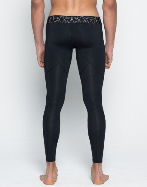 Black CITYBOYZ★USA AKTIV compression tights for athletic wear, shown on a model, emphasizing fit and fabric texture.